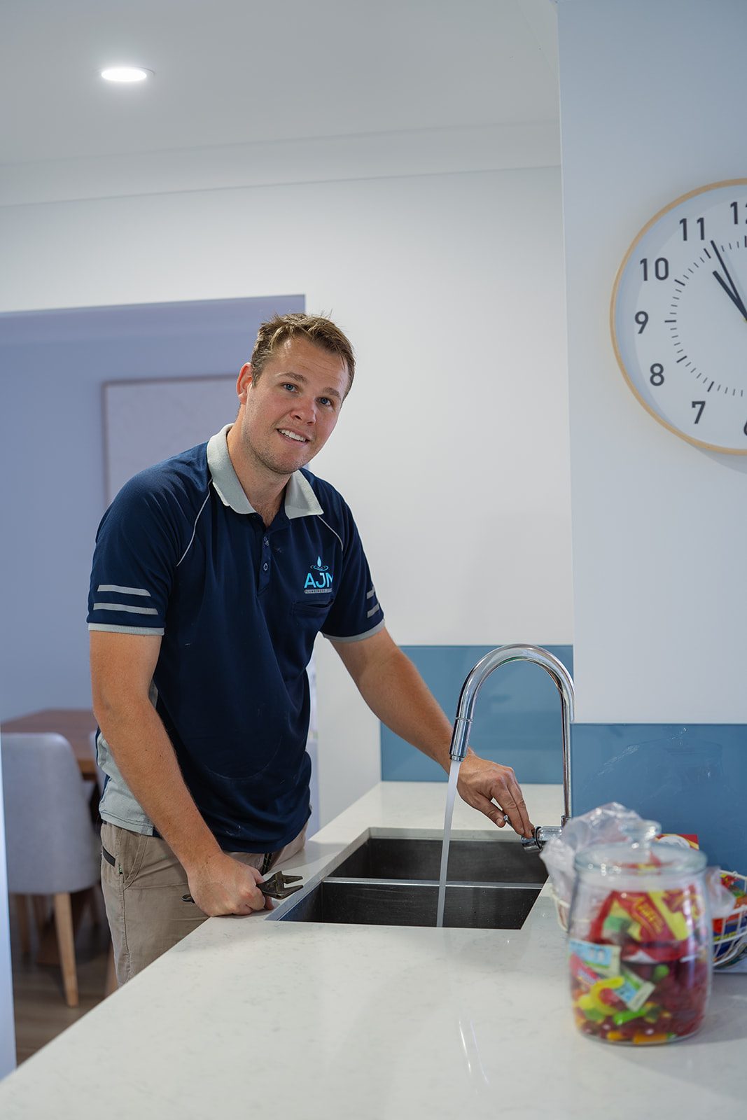Aaron testing a kitchen mixer tap