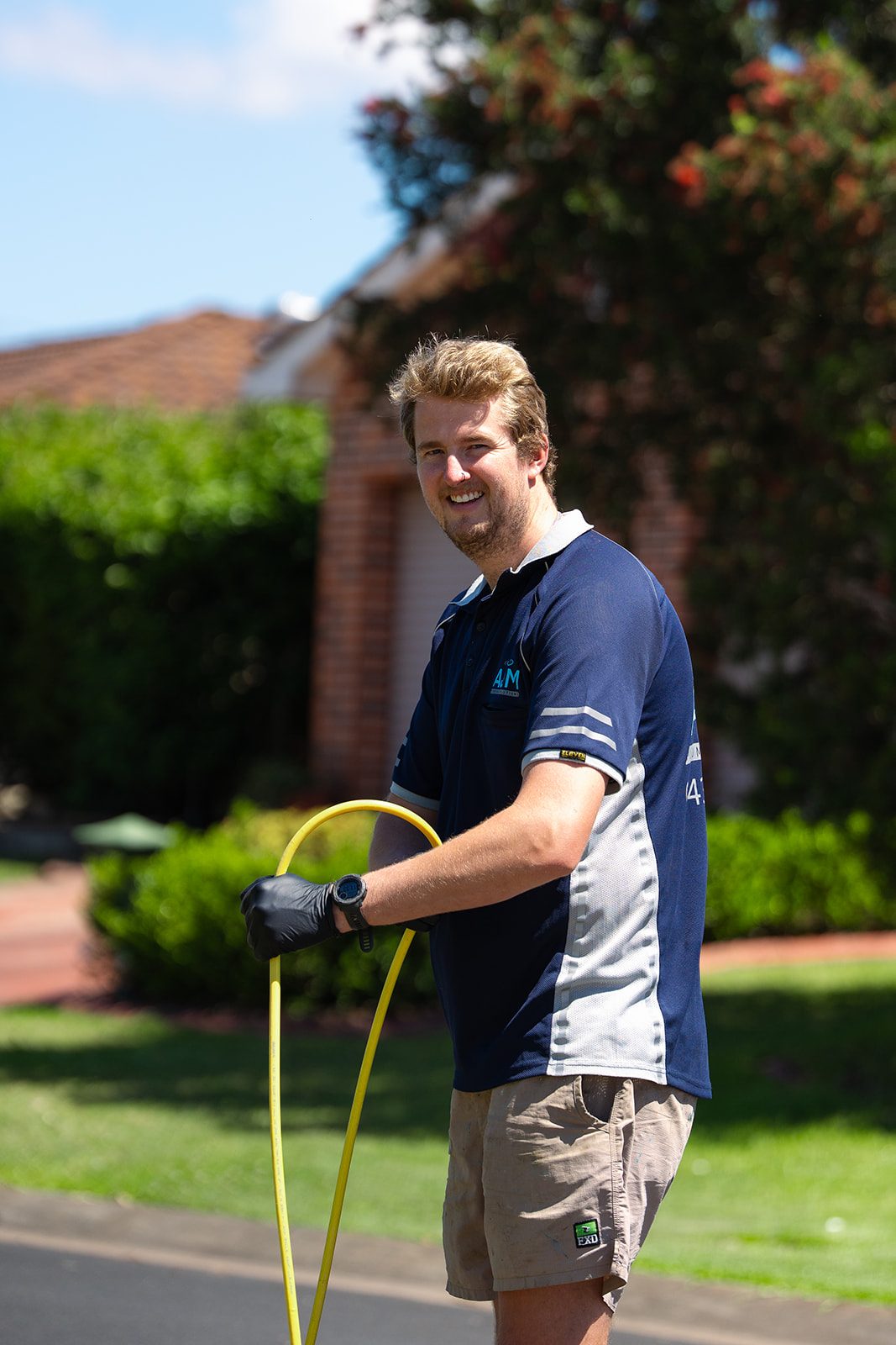 Aaron from AJM Plumbing Solutions with the drain jetter hose